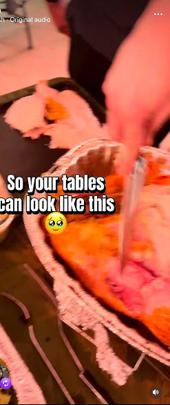 A creator slicing into a dish on a serving board